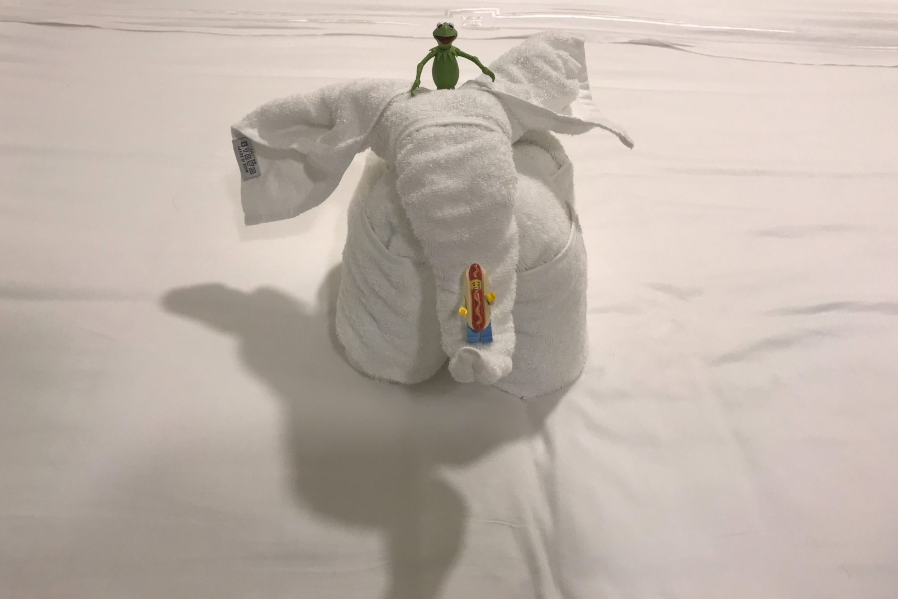 Kermit and Mr Hot Dog Lego Guy Taking A Ride On Towel Elephant