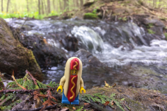 Lego Hot Dog Man standing in front of a Waterfall at Terra Cotta